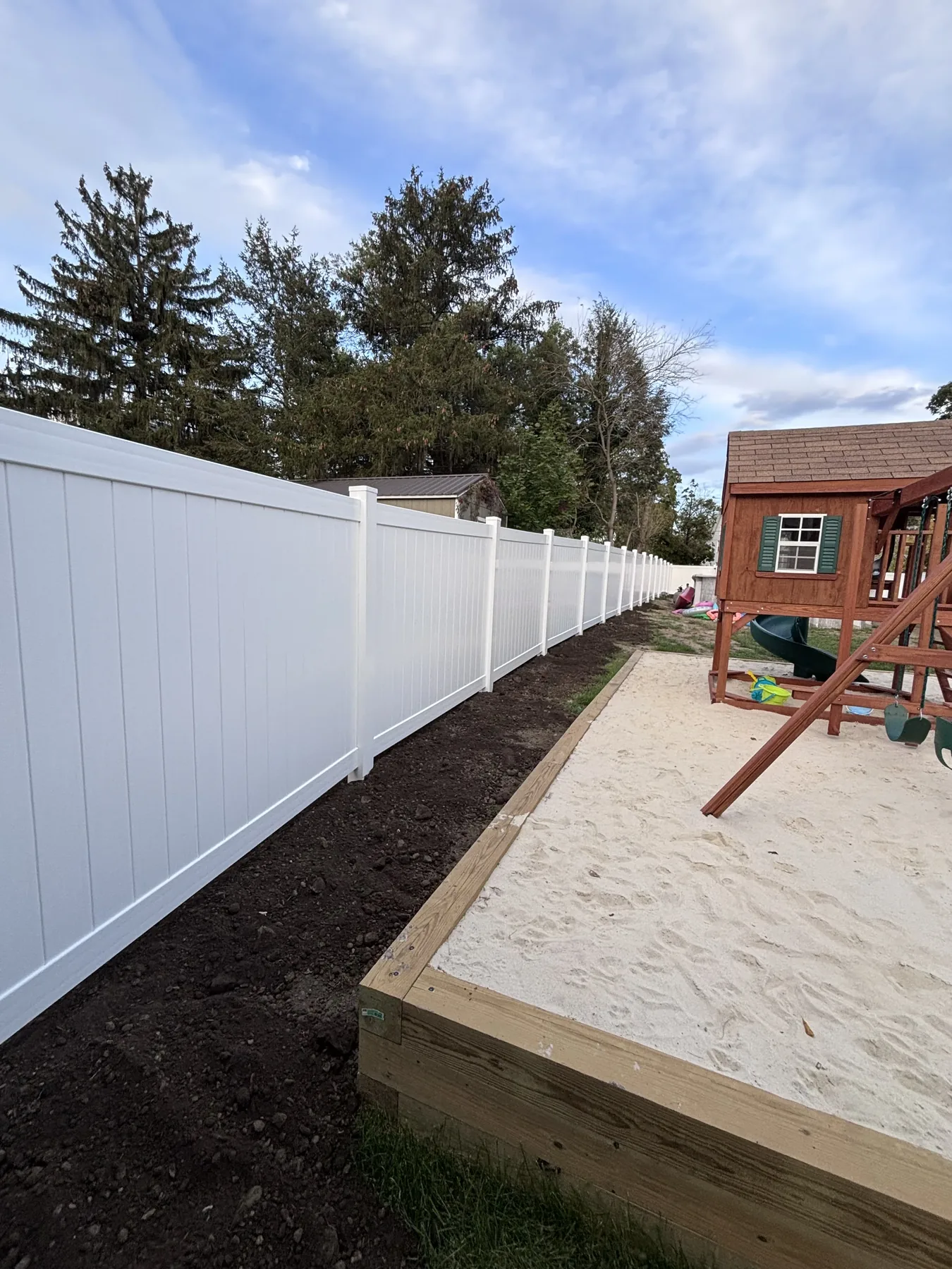 White vinyl fence installation and repair